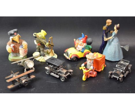 Toys - a Corgi Toys Magic Roundabout model, McHenry's Trike and Zebedee;  another Noddy's Car;  a Wells Brimtoy clockwork dan