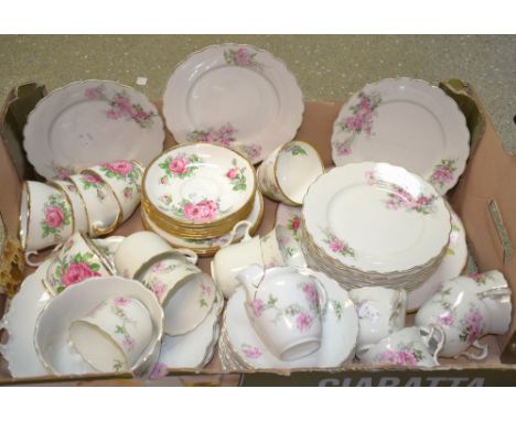 An Adderley English Rose pattern tea service for six comprising cups, saucers and side plates; another similar