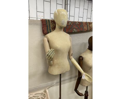 A Victorian style part painted beech mannequin on telescopic stand