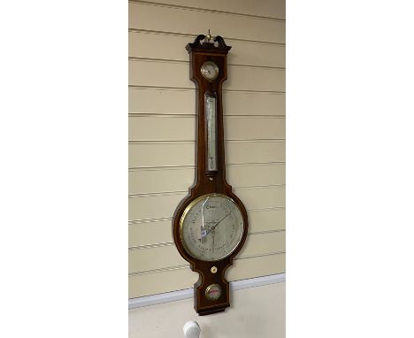 Abraham of Bath.  A Regency rosewood wheel barometer, height 112cm