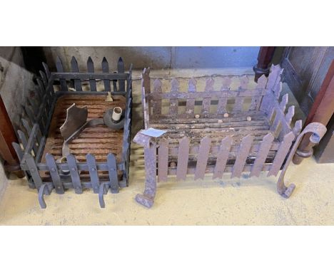 Two wrought iron fire grates, larger width 47cm and a cast metal two branch wall light