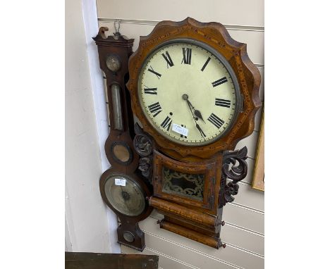 A Victorian inlaid drop dial wall clock and a 19th century wheel barometer