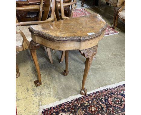 A Queen Anne revival burr walnut D shaped folding card table, width 83cm, depth 43cm, height 77cm