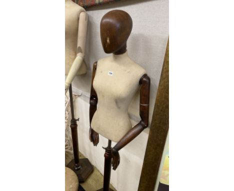 A Victorian style stained beech mannequin on telescopic stand