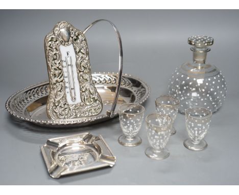 A silver-mounted Victorian thermometer, silver ashtray, plated basket stand, a small enamelled decanter and 4 matching glasse