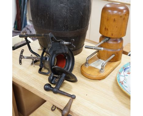 A wooden hat stretcher, 35cms high and manual calculator