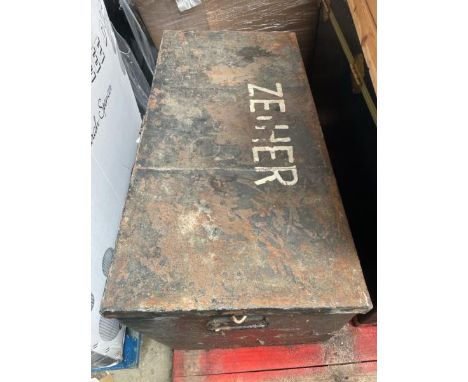A large metal trunk, full of various clothing, wigs and costumes, 42cm high x 96cm wide x 42cm deep