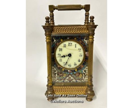 A French carriage clock with fluted columns and enamel face, stamped France, 15cm high including handle / AN35 