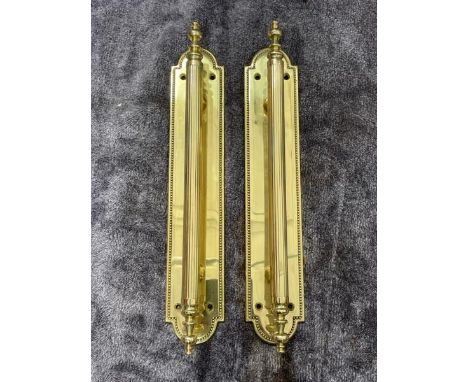 A pair of Carlisle Brass art deco style door pull handles, 30cm long