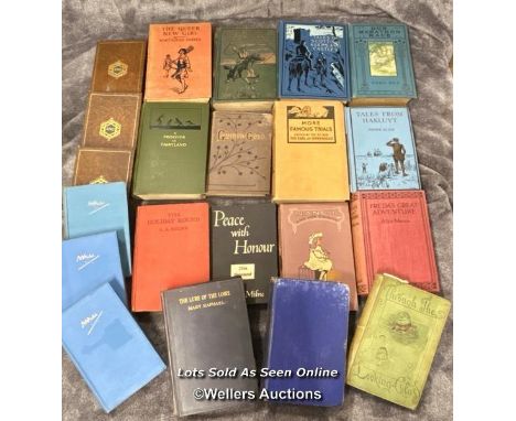 A collection of vintage children's books including Through the Looking Glass by Lewis Caroll 1898 peoples edition and eight b