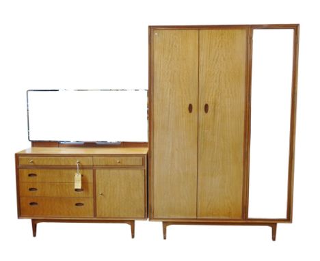 Heals triple wardrobe, figured light hardwood veneers, three doors, one mirrored with hanging rails and two shelves to interi