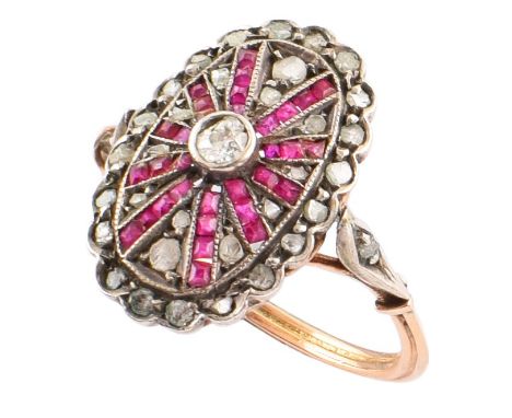 French Art Deco diamond and ruby oval cluster ring , the oval cluster comprising round old cut and rose cut diamonds, grain s