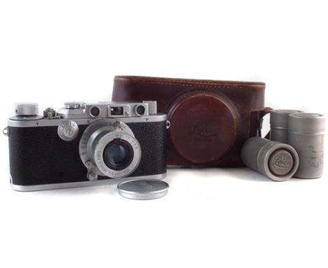 Leica IIIa Screw mount camera, serial number 290816 for 1938, fitted with Elmar f=5cm 1:3.5 lens with cap, together with thre