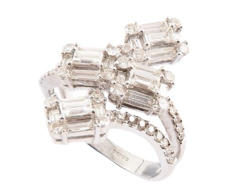 Diamond fancy four cluster cross over 18ct white gold ring with diamond set shoulders, the 4 rectangular clusters comprising 