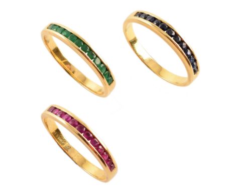 Set of 3 18ct yellow gold stacking rings , channel set with small round rubies, emeralds and sapphires to front section, gros