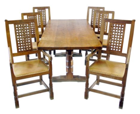 Robert "Mouseman" Thompson four single and two open arm carver chairs, each with carved and pierced woven splat-back, close n