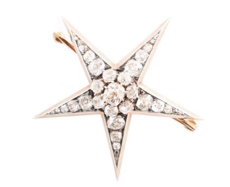 Victorian diamond star pendant/brooch , the 5-ray star silver claw set with 33 cushion shaped and round old cut diamonds, tot