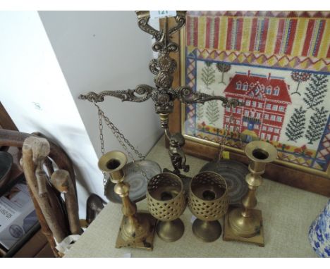 A selection of vintage brass wares including regency style balance scale set, candle stick pair etc