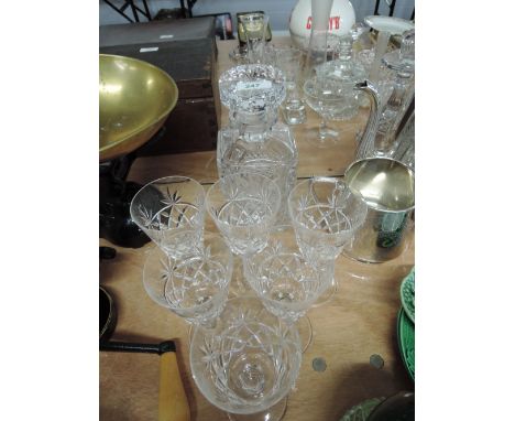 A set of heavy cut glass decanter and glass set wine spirit cocktail etc