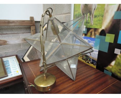 A vintage ceiling light , of star form