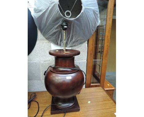A modern hardwood table lamp