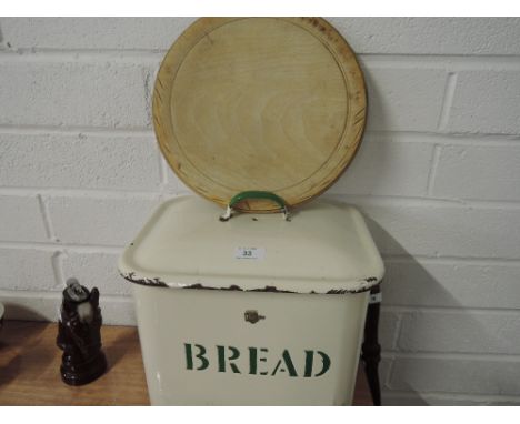 A vintage tin bread bin with cream and green enamel 