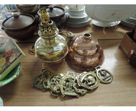 A vintage brass oil burner lamp marked Lampe Veritas converted to electric and other brass copper items