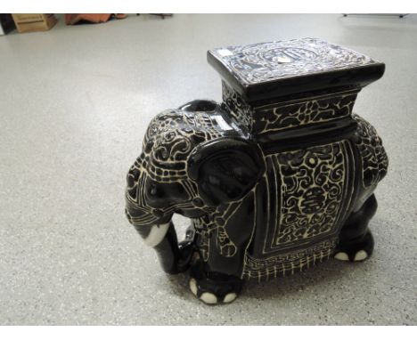 A large ceramic elephant  black with white detail ideal for plant stand
