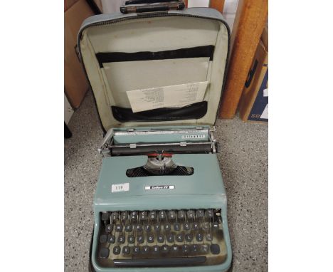 A vintage Lettera 22 Olive TTI typewriter with case