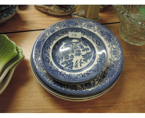 A selection of vintage ceramic plates by churchill in the willow pattern