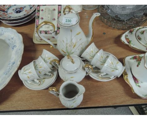 A coffee tea service with espresso style cups and saucers