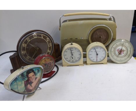 A collection of vintage clocks to include a Smiths timer, a Metamec electric mantle clock without plug and others along with 