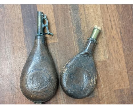 A 19th century leather and brass shot flask and powder flask Location:If there is no condition report shown, please request