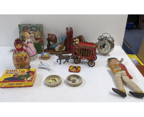 A collection of vintage toys to include a model circus carriage title 'overland circus' two music boxes A/F, Tintin bookends,