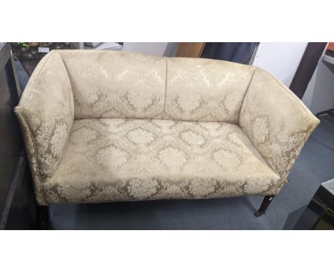 A late Victorian beige floral upholstered two seater sofa, on mahogany tapering lets, 75cm h x 137cm wLocation:If there is no