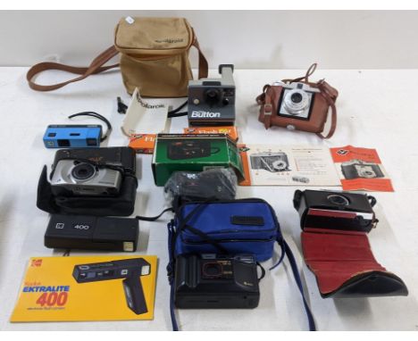 A collection of vintage cameras to include a Polaroid SX-70, an Agfa Isola 1, a Kodak Ektralite 400 and othersLocation:If the