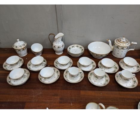 A 19th century French tea/coffee service decorated with flora and scrolls Location:If there is no condition report shown, ple