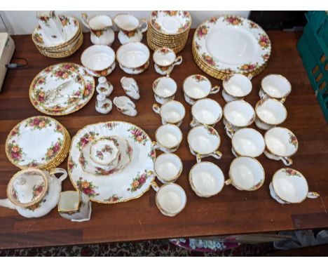 A Royal Albert Old Country Roses tea/coffee/dinner service to include twelve cups, saucers, six dinner, side plates and bowls