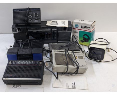 A collection of vintage radios to include a Crown CS-1100 stereo, a Sony Digicube, a York portable radio and othersLocation:I