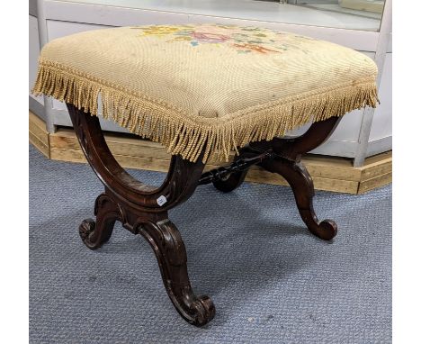 A Victorian mahogany and tapestry topped stool having x-framed supports and on scroll feet, 40cm h x 47cm wLocation:If there 