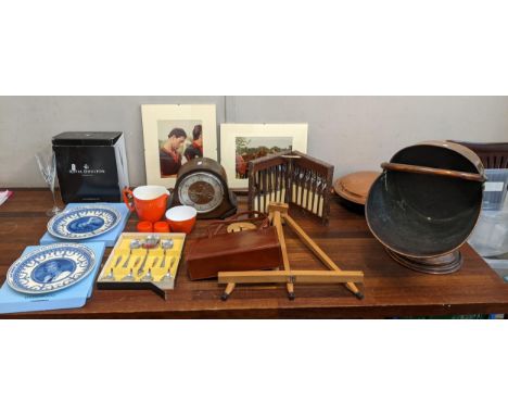 A mixed lot to include a coal scuttle, a bed pan, flatware, commemorative plates, a Smith's mantel clock, Wedgwood commemorat