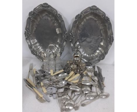 Mixed metalware to include two silver plated cruet sets and a pair of Portuguese serving dishes cast with shell and scroll ri