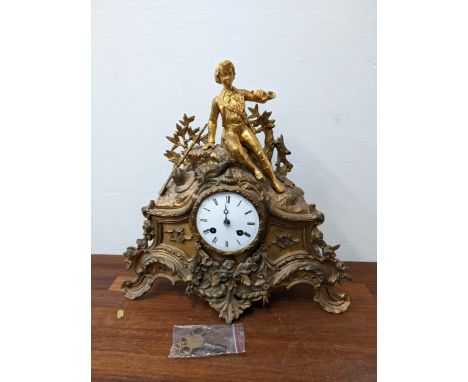 A brass, spelter and gilt metal cased late 19th century mantle clock/Location:If there is no condition report shown, please r