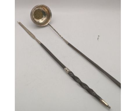 A silver toddy ladle together with a toddy ladle handleLocation: A3BIf there is no condition report shown, please request