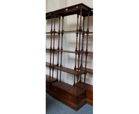 A reproduction mahogany tall 5-tier open shelf unit with drawer base, 71cm wide 179cm high