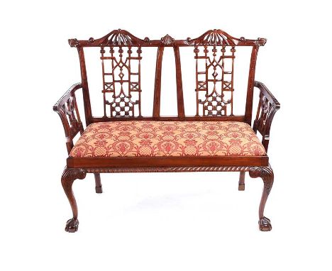 MAHOGANY CHIPPENDALE STYLE PIERCED BACK SETTEE WITH UPHOLSTERED SEAT.RAISED ON BALL AND CLAW FEET.HEIGHT: 41 INCHES.WIDTH: 48