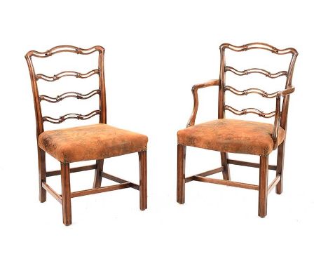 SET OF TEN EDWARDIAN LADDER BACK DINING ROOM CHAIRS WITH UPHOLSTERED BROWN LEATHER SEATS. RAISED ON REEDED LEGS AND UNDERSTRE