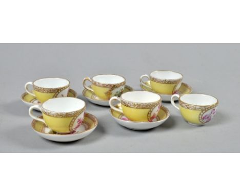 Six Meissen miniature cups and saucers of yellow ground, each with central print in puce monochrome of cupids engaged in vari