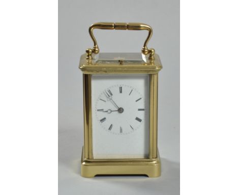 An early 20c French carriage clock striking and hour repeating on a bell. The movement has a replaced lever platform escapeme