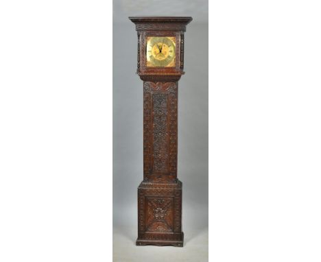 A mid 18c thirty hour longcase clock, the 12" square brass dial signed Richard Midgeley (probably Halifax). The dial has flor